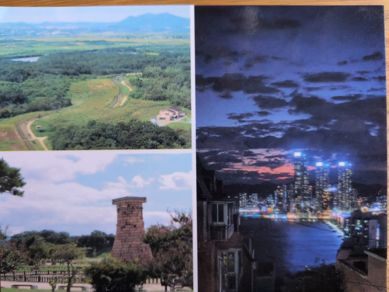 Das Bild ist eine Collage aus drei Fotos: oben links eine weite grüne Landschaft mit Wald und Bergen, unten links ein historischer Steinturm in einem Park und rechts eine beleuchtete Stadt bei Nacht am Wasser.