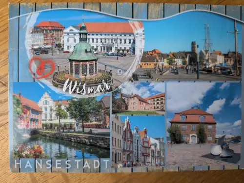 Collage von Wismar-Ansichten mit historischen Gebäuden, Marktplatz, Hafen und Kanal, beschriftet mit „Wismar HANSESTADT“.