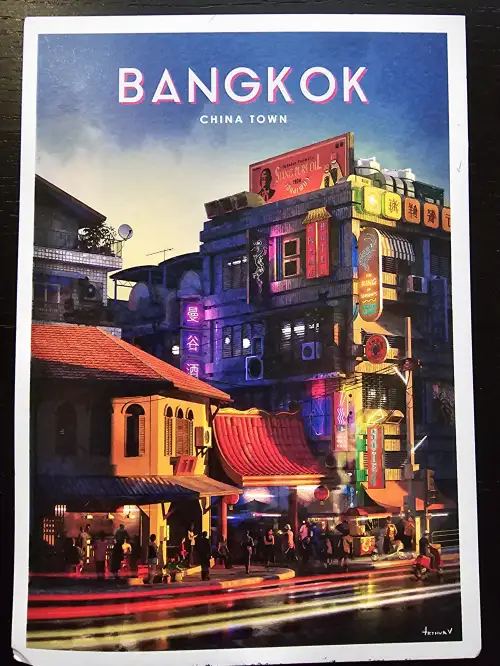 Eine lebendige, farbenfrohe Nachtszene in Bangkoks Chinatown, geprägt von leuchtenden Neonreklamen, geschäftigen Straßen und Menschen.